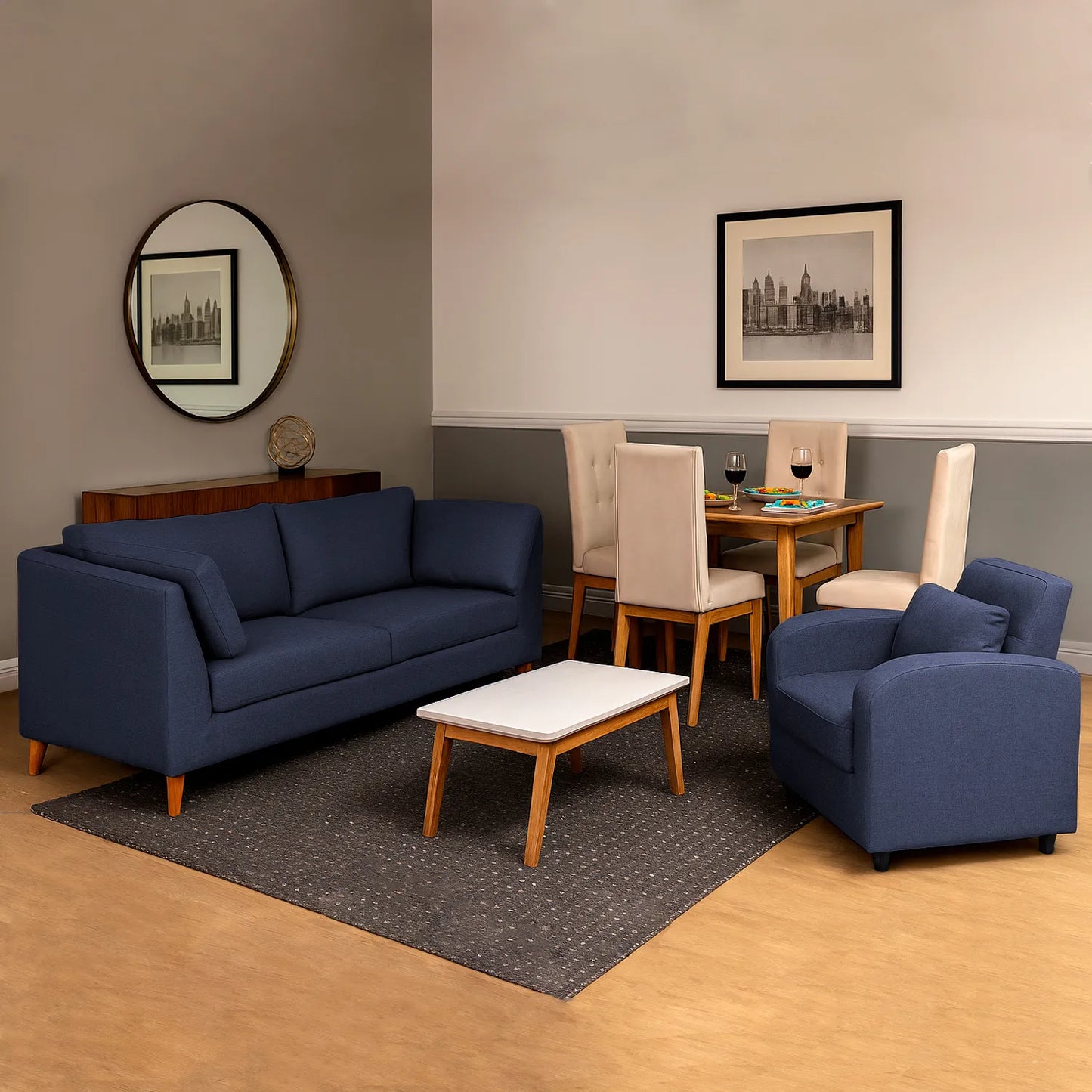 Sofá gales 3 puestos en tela azul, con patas en madera color natural, ubicado en sala moderna con mesa auxiliar y puff poltrona color azul, ambientado con comedor de madera en tono natural y sillas tapizadas color beige. Ideal para hogares colombianos que buscan confort y estilo moderno - All Star muebles
