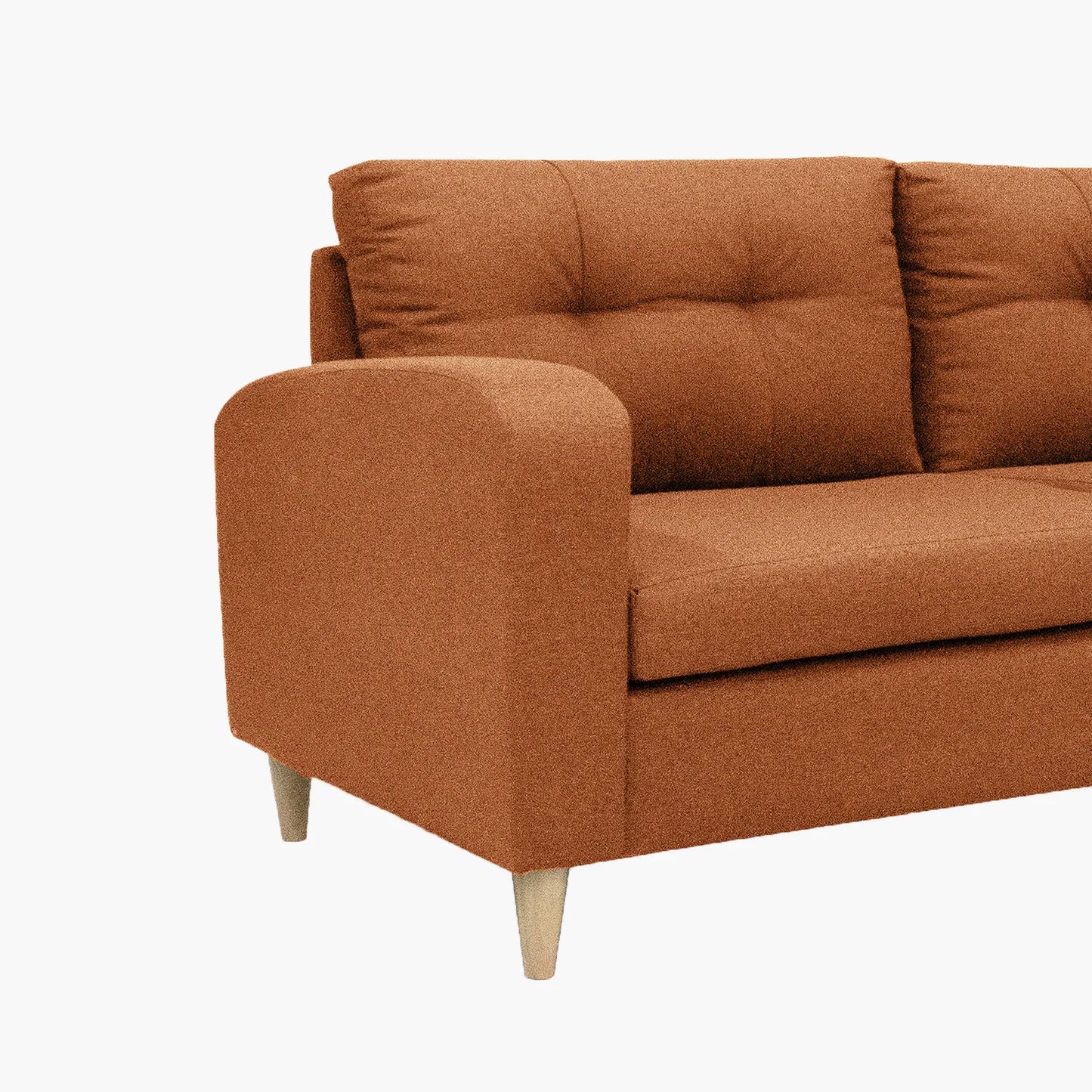 Sofá Brisa visto en detalle en tela color terracota con patas de madera clara y diseño moderno con tapizado capitoné, ideal para salas modernas - All Star Muebles Colombia