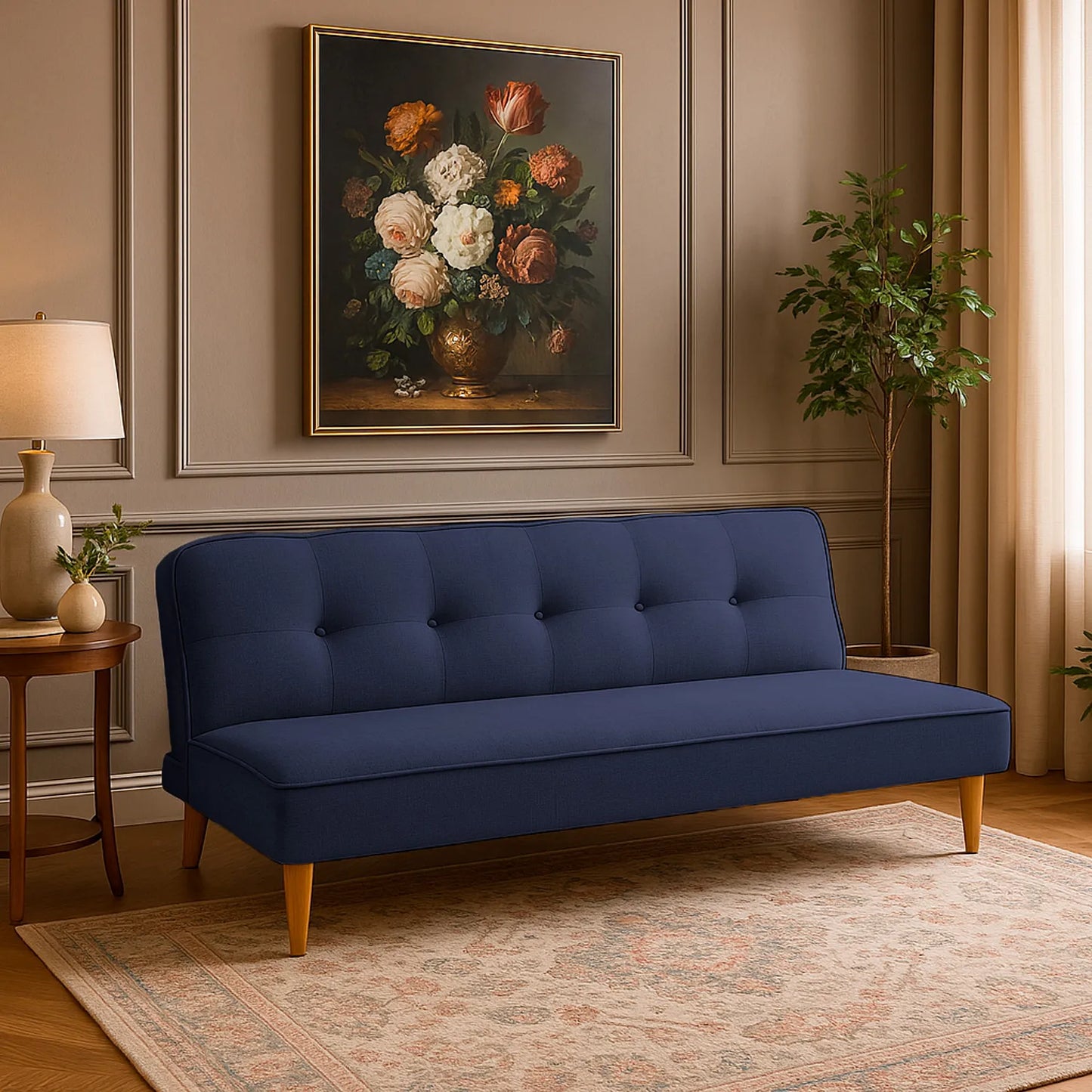 Sofá cama Chic tipo clic clac tapizado en color azul, con patas en madera en tono natural, ubicado en sala moderna minimalista, ambientado con mesa auxiliar, Ideal para hogares colombianos que buscan confort y estilo moderno - All Star muebles