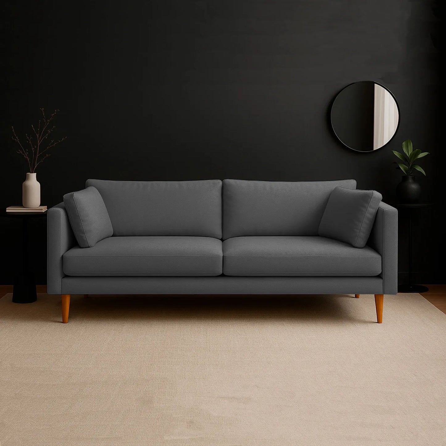 Sofá Gales 3 puestos tapizado en color gris, con patas en madera torneadas tono natural, ubicado en sala moderna minimalista, ambientado con elementos decorativos, Ideal para hogares colombianos que buscan confort y estilo moderno - All Star muebles