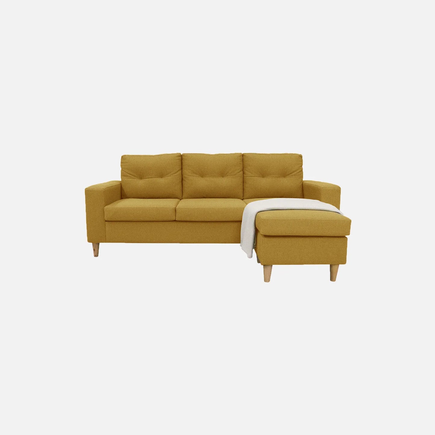 Sala en L Cielo visto de frente en tela color mostaza con patas de madera clara y manta decorativo blanca, ideal para salas modernas - All Star Muebles Colombia