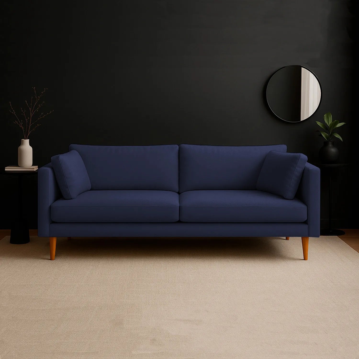 Sofá Gales 3 puestos tapizado en color azul, con patas en madera torneadas tono natural, ubicado en sala moderna minimalista, ambientado con elementos decorativos, Ideal para hogares colombianos que buscan confort y estilo moderno - All Star muebles