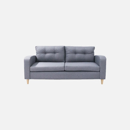 Sofá Brisa visto de frente en tela color gris con patas de madera clara y diseño moderno con tapizado capitoné, ideal para salas modernas - All Star Muebles Colombia