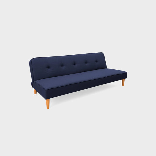 Sofá cama Chic tipo clic clac visto en perspectiva, tapizado color azul, con patas en madera torneada tono natural, fotografía sobre fondo blanco, ideal para visualizar la combinación de estilos y colores - All Star muebles