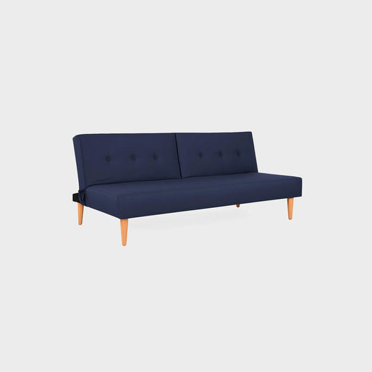 Sofá cama Trevor tipo clic clac visto en perspectiva, tapizado color azul, con patas en madera torneada tono natural, fotografía sobre fondo blanco, ideal para visualizar la combinación de estilos y colores - All Star muebles