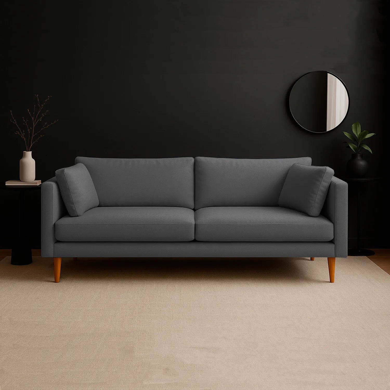 Sofá Gales 3 puestos tapizado en color gris, con patas en madera torneadas tono natural, ubicado en sala moderna minimalista, ambientado con elementos decorativos, Ideal para hogares colombianos que buscan confort y estilo moderno - All Star muebles