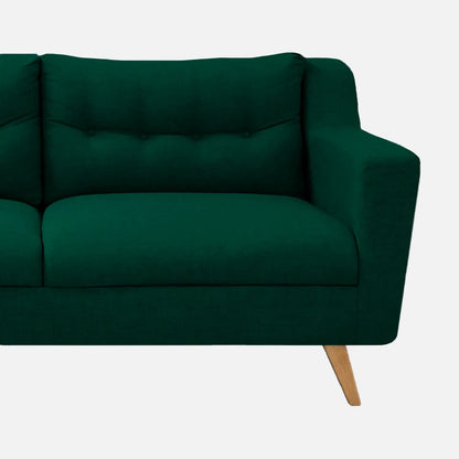 Sofá Loto visto en detalle, tapizado en tela verde y patas en madera tono natural, ideal para casas y apartamentos - All Star Muebles Colombia
